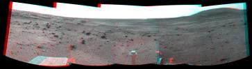 NASA's Mars Exploration Rover Spirit took the images combined to make this stereo view on March 21, 2009. West is at the center, where a dust devil is visible in the distance. 3D glasses are necessary to view this image.