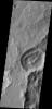 This image captured by NASA's Mars Odyssey shows dark slope streaks in an unnamed crater in Terra Sabaea.