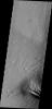 Constant sand-blasting by the winds on Mars have eroded and sculpted the surface in the equatorial region around Medusae Fossae in this image captured by NASA's Mars Odyssey.