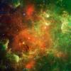 This visible light/infrared image from NASA's Spitzer Space Telescope shows a swirling landscape of stars known as the North America nebula. Clusters of young stars (about one million years old) can be found throughout the image.