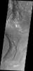 Aurorae Chaos is located at the eastern end of the chasmata forming Vallis Marineris. This image from NASA's 2001 Mars Odyssey spacecraft is very close to the chasmata and at a higher elevation than the floor of the chasmata.