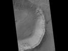 This image contrasts gullies and recurring warm-season slope flows appearing in the same crater, in the middle southern latitudes of Mars. It was taken Nov. 27, 2007, by the HiRISE camera onboard NASA's Mars Reconnaissance Orbiter.