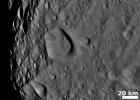 NASA's Dawn spacecraft obtained this image showing cratered terrain with hills and ridges on Vesta's surface on August 6, 2011. This image was taken through the framing camera's clear filter aboard the spacecraft.