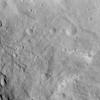 NASA's Dawn spacecraft obtained this image of craters and grooves in the south polar region on asteroid Vesta with its framing camera on Sept. 3, 2011. The image has a resolution of about 220 meters per pixel.