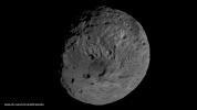 This image obtained by the framing camera on NASA's Dawn spacecraft shows the south pole of the giant asteroid Vesta. Scientists are discussing whether the circular structure that covers most of this image originated by a collision with another asteroid.