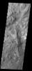 This image from NASA's 2001 Mars Odyssey spacecraft shows a portion of Aureum Chaos. Several layers of material are visible in the image.