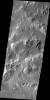 Gullies are visible in this image of the northern rim of Holden Crater as seen by NASA's 2001 Mars Odyssey spacecraft.