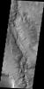 This unnamed as seen by NASA's 2001 Mars Odyssey spacecraft channel drains part of Margaritifer Terra.