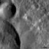 This image from NASA's Dawn spacecraft shows a close up image of two of the craters that make up the three 'Snowman' craters on asteroid Vesta.