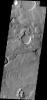 The channels on Mars in this image captured by NASA's Mars Odyssey spacecraft are located between Ares Vallis, a large channel, and Siinka Vallis, a much smaller channel.