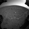 This image shows the tracks left by NASA's Curiosity rover on Aug. 22, 2012, as it completed its first test drive on Mars. This image was taken by a front Hazard-Avoidance camera, which has a fisheye lens.