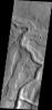 The channel feature in this image captured by NASA's Mars Odyssey spacecraft is part of Tyrrhena Fossae, a large depression that dissects Tyrrhena Mons.