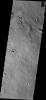 This image captured by NASA's 2001 Mars Odyssey spacecraft shows Winslow Crater, a fairly young crater. The darker rayed ejecta is still visible surrounding the crater.