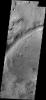 What appears to be a channel in this image captured by NASA's 2001 Mars Odyssey spacecraft is actually one of the fractures that make up Nili Fossae.