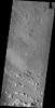 The small dark windstreaks as seen by NASA's 2001 Mars Odyssey spacecraft are located near Lycus Sulci.