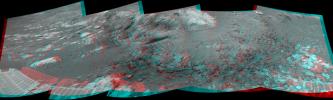 This 180-degree 3-D mosaic of images from the navigation camera on the NASA Mars Exploration Rover Opportunity shows the rover close to the outcrop called 'Copper Cliff,' which is in the center of this scene.