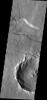 This image from NASA's 2001 Mars Odyssey spacecraft shows a small portion of a east/west trending fracture in Thaumasia Planum on Mars.