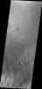 This image from NASA's Mars Odyssey spacecraft provides another look at one of the larger channels dissecting the rim of Gale Crater that may be the source of the dune material.