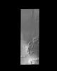 The linear ridges in this image captured by NASA's 2001 Mars Odyssey spacecraft are located near the south polar cap.
