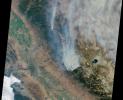 This visible image of California's Rim Fire was acquired Aug. 23, 2013 by the Multi-angle Imaging SpectroRadiometer (MISR) instrument on NASA's Terra spacecraft, showing extensive, brownish smoke.