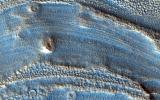 This image captured by NASA's Mars Reconnaissance Orbiter spans from wall to wall across the center area of an impact crater. From what we see, a lot has happened to modify the appearance of the crater since it was formed.