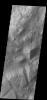 Several different surface textures are present on the lower elevations of Iani Chaos in this image from NASA's 2001 Mars Odyssey spacecraft.