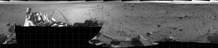The view from NASA's Mars rover Curiosity covers a full 360 degrees, centered toward the south, with north at both the left and right ends. Nearer the horizon is a sand dune at a location called 'Dingo Gap'.