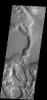 This complex region of channels and chaos is located south of Chia crater and east of the much larger Maja Valles. This image was captured by NASA's 2001 Mars Odyssey spacecraft.