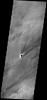 The windstreaks in this image from NASA's 2001 Mars Odyssey spacecraft are located on the lava plains between Pavonis Mons and Noctis Fossae.