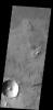 Multiple overlapping lobes of ejecta are visible in this image of an unnamed crater in Chryse Planitia as seen by NASA's 2001 Mars Odyssey spacecraft.