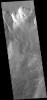 This image captured by NASA's 2001 Mars Odyssey spacecraft shows part of the north wall of Valles Marineris near Melas Chasma.
