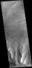 This image captured by NASA's 2001 Mars Odyssey spacecraft shows eroded materials on the floor of Candor Chasma.