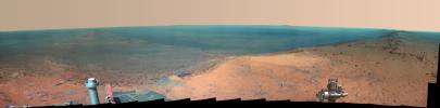 NASA's Mars Exploration Rover Opportunity obtained this view from the top of the 'Cape Tribulation' segment of the rim of Endeavour Crater. The rover reached this point three weeks before the 11th anniversary of its January 2004 landing on Mars.
