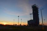 The sun sets behind Space Launch Complex 2, Vandenberg Air Force Base, California, where NASA's Soil Moisture Active Passive (SMAP) mission satellite is being prepared for liftoff. Launch is scheduled for Jan. 29.