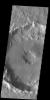This image captured by NASA's 2001 Mars Odyssey spacecraft shows an unnamed crater in Noachis Terra. This crater has a pit in the center of the floor of the crater.