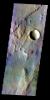 The THEMIS VIS camera contains 5 filters. The data from different filters can be combined in multiple ways to create a false color image. This false color image from NASA's 2001 Mars Odyssey spacecraft shows part of Solis Planum.