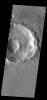 This image captured by NASA's 2001 Mars Odyssey spacecraft shows Gasa Crater, a small crater within a larger crater.