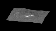 This still from an animation, made using images taken by NASA's Dawn spacecraft, shows Occator crater on Ceres, home to a collection of intriguing bright spots.