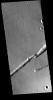 This image captured by NASA's 2001 Mars Odyssey spacecraft shows one of the many graben that make up Labeatis Fossae.