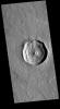 This image captured by NASA's 2001 Mars Odyssey spacecraft shows Steinheim Crater, located in Arcadia Planitia.