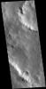 This image captured by NASA's 2001 Mars Odyssey spacecraft shows a portion of two unnamed craters in Terra Sabaea.