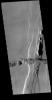This image captured by NASA's 2001 Mars Odyssey spacecraft shows part of Tractus Catena, just one of many north/south trending tectonic graben located south of Alba Mons.