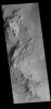 This image captured by NASA's 2001 Mars Odyssey spacecraft shows part of the floor of Hale Crater. The mountains in the image are part of the elongated central peak of the crater.