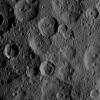 The craters Takel and Cozobi are featured in this image of Ceres from NASA's Dawn spacecraft. Takel is the young crater with bright material on the left of this image, and Cozobi is the sharply defined crater just below center.