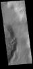 This image captured by NASA's 2001 Mars Odyssey spacecraft shows several channels in and around unnamed craters in Noachis Terra.