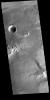 This image captured by NASA's 2001 Mars Odyssey spacecraft shows part of Daedalia Planum, which is comprised of lava flows from Arsia Mons.