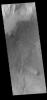This image captured by NASA's 2001 Mars Odyssey spacecraft shows sand dunes on the floor of Sumgin Crater.
