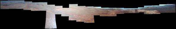 This enhanced-color view from within 'Perseverance Valley,' on the inner slope of the western rim of Endurance Crater on Mars, includes wheel tracks from NASA's Opportunity rover's descent of the valley.