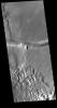 This image from NASA's Mars Odyssey shows the right angle intersection of the depressions in one of the graben that form Sacra Fossae.