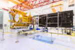 SWOT's solar panels unfold as part of a test in January at a Thales Alenia Space facility in Cannes, France, where the satellite is being assembled. SWOT will measure elevations of Earth's ocean and surface water.
